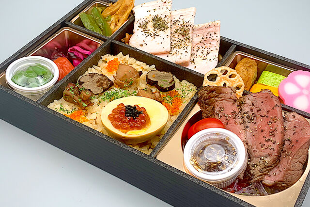 罪深き肉 クルニク-熟成牛ランプステーキと香草ローストポークのトリュフ香るラン卵弁当